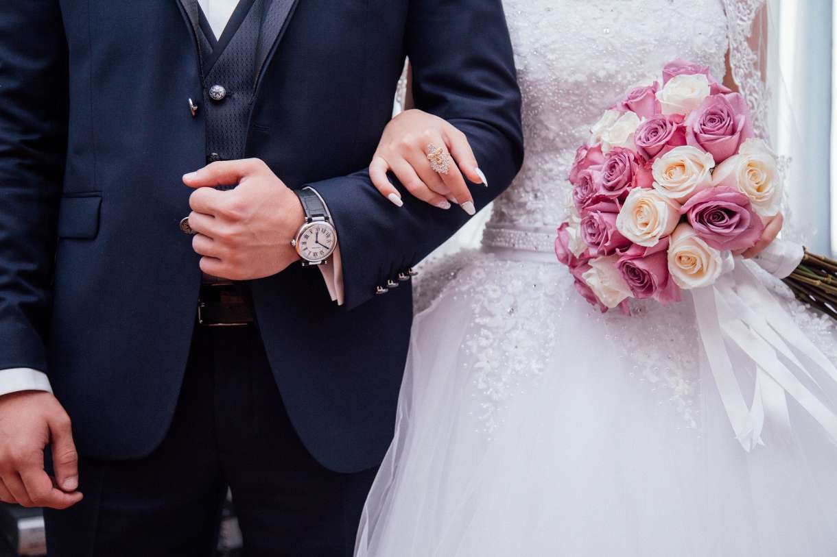 Bride and groom, arm in arm